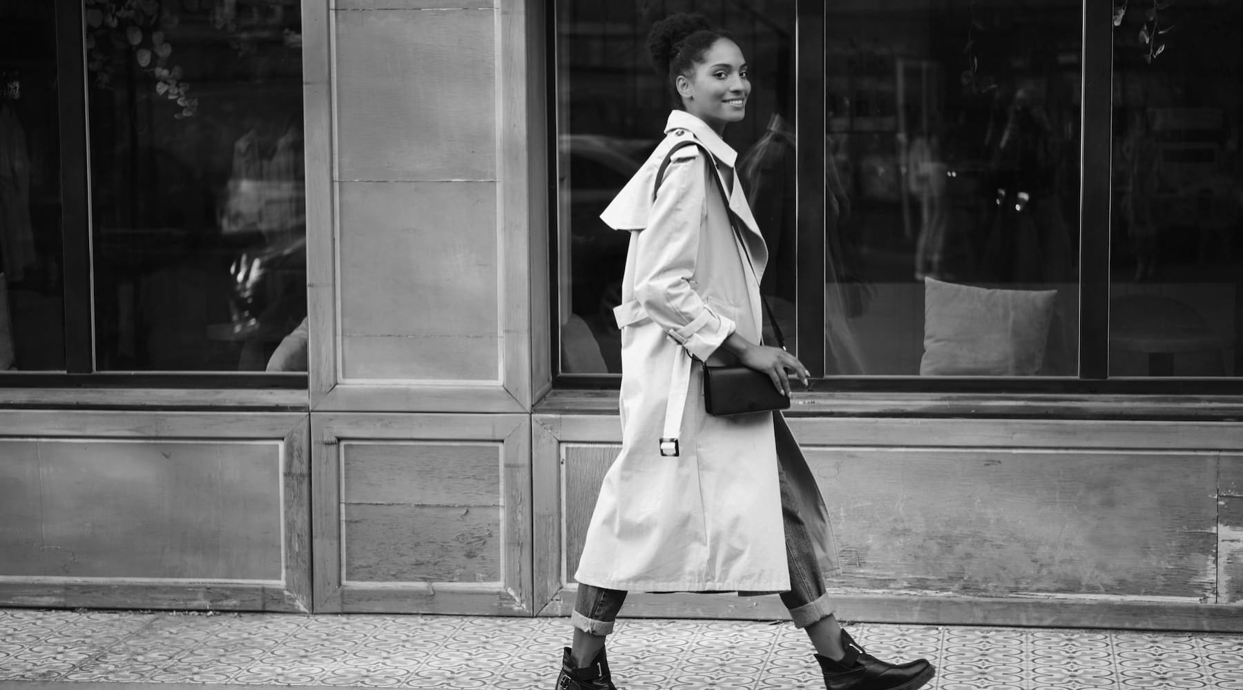 a person walking on a sidewalk